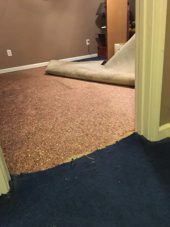 Carpet pad removal revealing water damage during Drying & Dehumidification in Santee